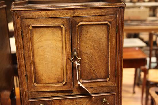 A pair of George III style mahogany bedside cupboards, W.1ft 2.75in.